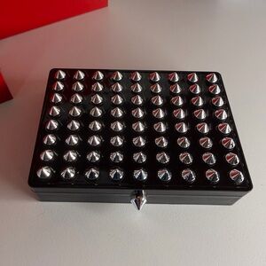 Christian Louboutin black collectible makeup case